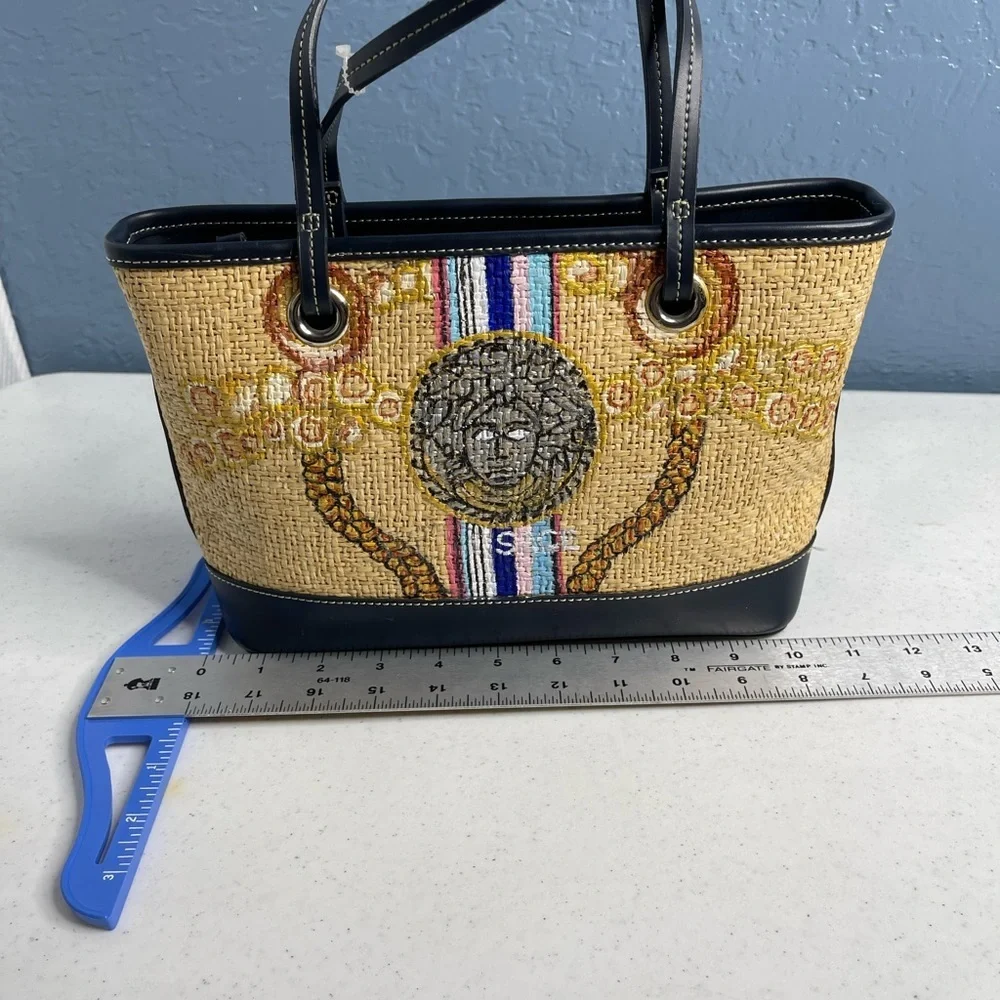 Ann Taylor Loft tweed hand painted small tote. Button snap closure/ metal feet.